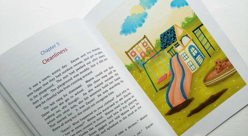 May include: An open book with an illustration of a colorful playground with a slide, swings, and a sandbox. The text on the page reads "Chapter 5 Cleanliness".
