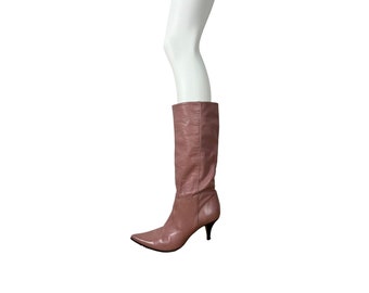 A pair of vintage pointy mid-calf boots in pale pink leather size 6