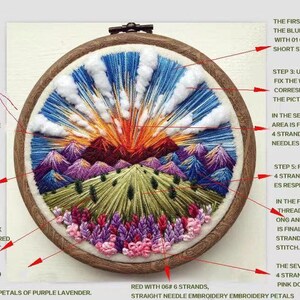 May include: A close-up of a finished embroidery hoop depicting a sunset landscape with purple hills, green grass, and a blue sky. The embroidery is done with colorful threads and includes instructions for each step of the embroidery process.