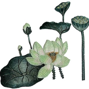 May include: Embroidered patch featuring a green lotus flower with white petals and a yellow center. The patch also includes green leaves and buds.
