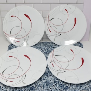 May include: A handmade wooden sign with the text "Welcome to our home" in a handwritten style. The sign is painted white with a distressed finish and a dark brown border. It is designed to be hung on a wall.