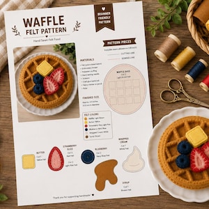 Peut inclure: Un patron PDF numérique pour un projet d'artisanat en feutrine représentant une gaufre, incluant des instructions, des listes de matériaux et des modèles pour la base, le beurre, les fraises, les myrtilles, la crème et le sirop.