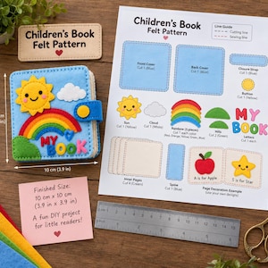 May include: A felt craft kit for a children's book, including a finished 10 cm by 10 cm blue book with a sun and rainbow, a printed pattern sheet, a metal ruler, and a note stating the finished size is 10 cm by 10 cm.