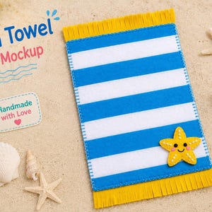 May include: A rectangular felt beach towel mockup featuring horizontal blue and white stripes, yellow fringed ends, and a yellow felt starfish applique with a smiling face. The text Beach Towel Felt Mockup and Handmade with Love is visible.