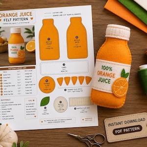 May include: A felt orange juice bottle craft pattern printed on paper, featuring a finished orange felt bottle with a white label reading 100% ORANGE JUICE, green felt leaves, and an orange slice detail. Includes sewing instructions and thread spools.