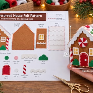 May include: A gingerbread house felt pattern sheet with cutting and sewing lines, decorative pieces, and a finished felt gingerbread house measuring 9 cm by 8 cm by 6 cm (3.5 in by 3.1 in by 2.4 in) with red, white, and green candy accents.