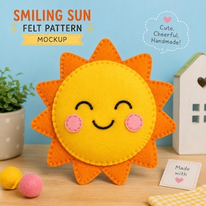 May include: A yellow and orange felt sun ornament with a smiling face, black stitched eyes and mouth, and pink circular cheeks. The text SMILING SUN FELT PATTERN MOCKUP appears at the top, with a speech bubble saying Cute. Cheerful. Handmade!