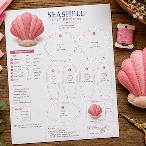 Pode incluir: Um documento de molde de feltro Seashell com instruções e diagramas para criar uma concha de feltro rosa. A página inclui uma lista de materiais, peças numeradas e dicas de costura. Uma concha de feltro acabada, linha rosa e tesouras douradas estão visíveis.