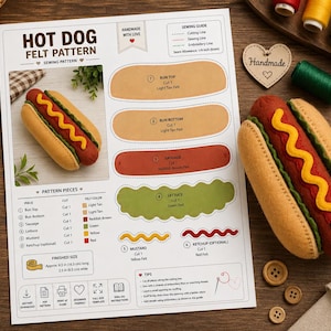 May include: A sewing pattern sheet for a felt hot dog, featuring diagrams for bun, sausage, lettuce, and mustard pieces. The document includes text labels, a finished size of 6.5 inches long by 2.5 inches wide, and a photo of the finished felt hot dog.