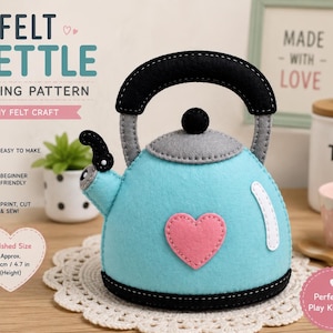 May include: A felt kettle sewing pattern featuring a light blue kettle with a grey lid, black handle, and a pink heart applique. The text reads Felt Kettle Sewing Pattern, Easy to Make, Beginner Friendly, Print, Cut & Sew, and Finished Size Approx. 12 cm.