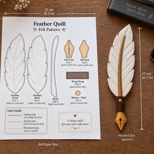 May include: A Feather Quill felt pattern printed on A4 paper measuring 8.3 inches by 11.7 inches, featuring templates for a white feather, gold nib, and brown strap. A finished 6.7-inch long white felt quill with a gold nib sits next to the paper.