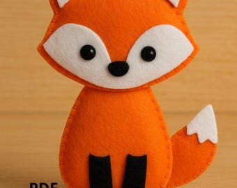 May include: An orange felt fox with white accents and black details. The fox has a white-tipped tail, white inner ears, and black eyes and feet. The text "Instant Download" and "PDF Tutorial + Pattern" are visible.
