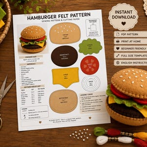 May include: A digital sewing pattern for a felt hamburger, featuring a printed instruction sheet with diagrams for bun, patty, lettuce, tomato, cheese, and onion pieces, alongside a finished felt hamburger toy and embroidery thread.