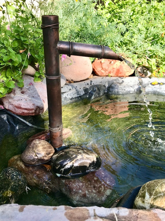 Fuente Fuente de cobre Caño de agua Caída de agua contemporánea