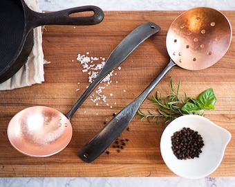 Set of two Hand forged stainless steel and copper cooking utensils. Soup ladle and slotted spoon