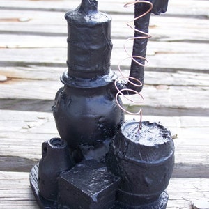 Handcrafted Moonshine Still Made from Coal in Kentucky