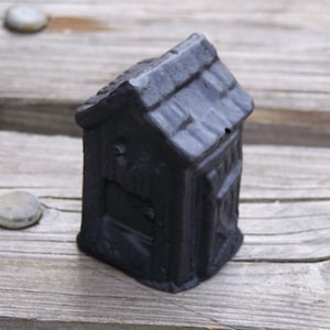 Handcrafted Small Outhouse Made from Coal in Kentucky