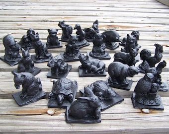 Handcrafted from coal 24 piece animal assortment