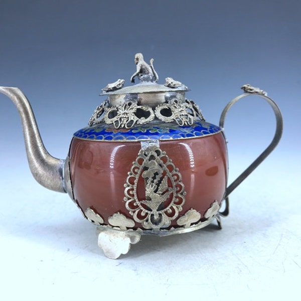 Chinese outsourcing Tibetan silver teapot