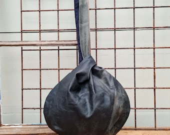 Black leather knot bag, leather wristlet, no waste bag, knot bag, japanese bag, leather bag, recycled leather bag, reused leather bag,