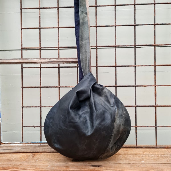 Black leather knot bag, leather wristlet, no waste bag, knot bag, japanese bag, leather bag, recycled leather bag, reused leather bag,