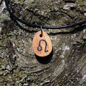 Tiny wooden Lio pendant