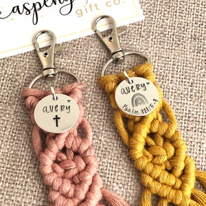 5" long macrame keychain with personalized discs featuring a cross or rainbow, name, and Bible verse.  These keychains come in a variety of colors and are fully customized