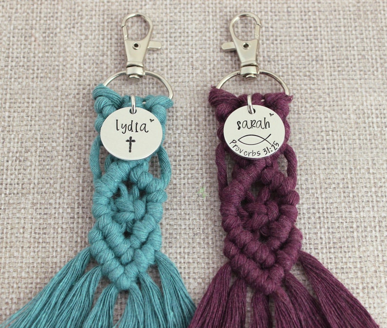 5" long macrame keychain with personalized discs featuring a cross or ichthys, name, and Bible verse.  These keychains come in a variety of colors and are fully customized