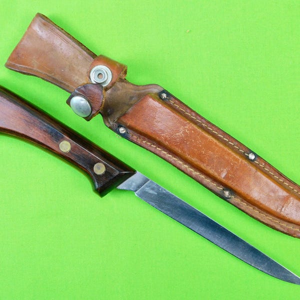 Vintage US 1978 Western S-W 766 visfiletmes met schede