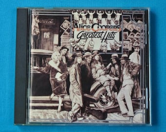CD de música vintage de Alice Cooper Greatest Hits Heavy Metal com livro