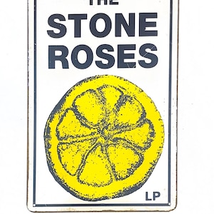 Letrero de metal de Stone Roses
