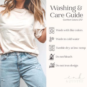 May include: A cream-colored t-shirt and light blue jeans are shown in this image. The shirt has a crew neck and short sleeves. Text on the right side of the image reads "Washing & Care Guide" with washing instructions and the brand name "ink & QUOTES".