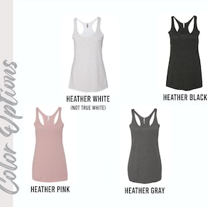 May include: Four tank tops in different colours: heather white, heather black, heather pink, and heather grey. The tank tops are all the same style, with a scoop neck and racerback.