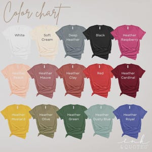 May include: A color chart displays various t-shirt colors, including white, black, red, and heather shades like peach, mauve, and dusty blue. The text "Color chart" is at the top, with "ink & QUOTES" at the bottom.