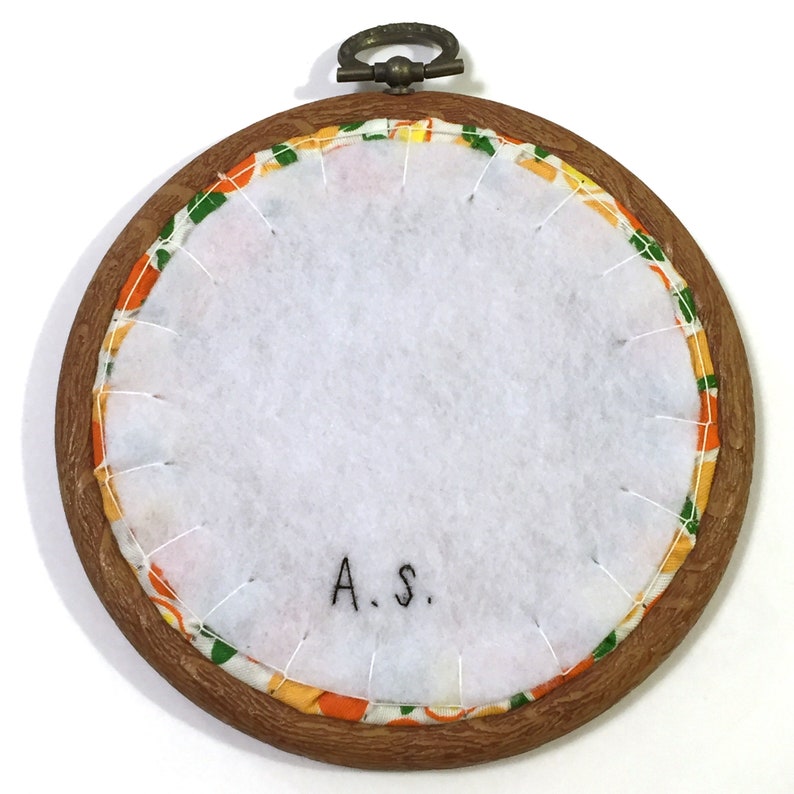 Peachy handmade embroidery artwork