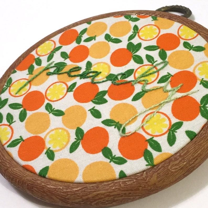 Peachy handmade embroidery artwork