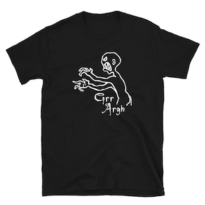 May include: Black t-shirt with a white graphic of a monster with the text "Grr Argh" underneath.