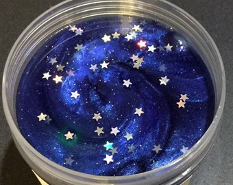Starry Night - A clear glue based slime with holo stars throughout.  Comes with a glittery star charm
