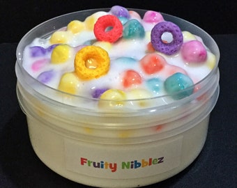 Fruity Nibblez -  a fruity scented cereal milk slime featuring brightly coloured marshmallow beads. Comes with three charms.