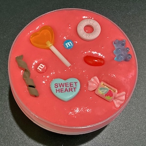 Party Mix - a fun slay slime scented like Red Ripperz lollies.  Comes with lots of candy themed charms