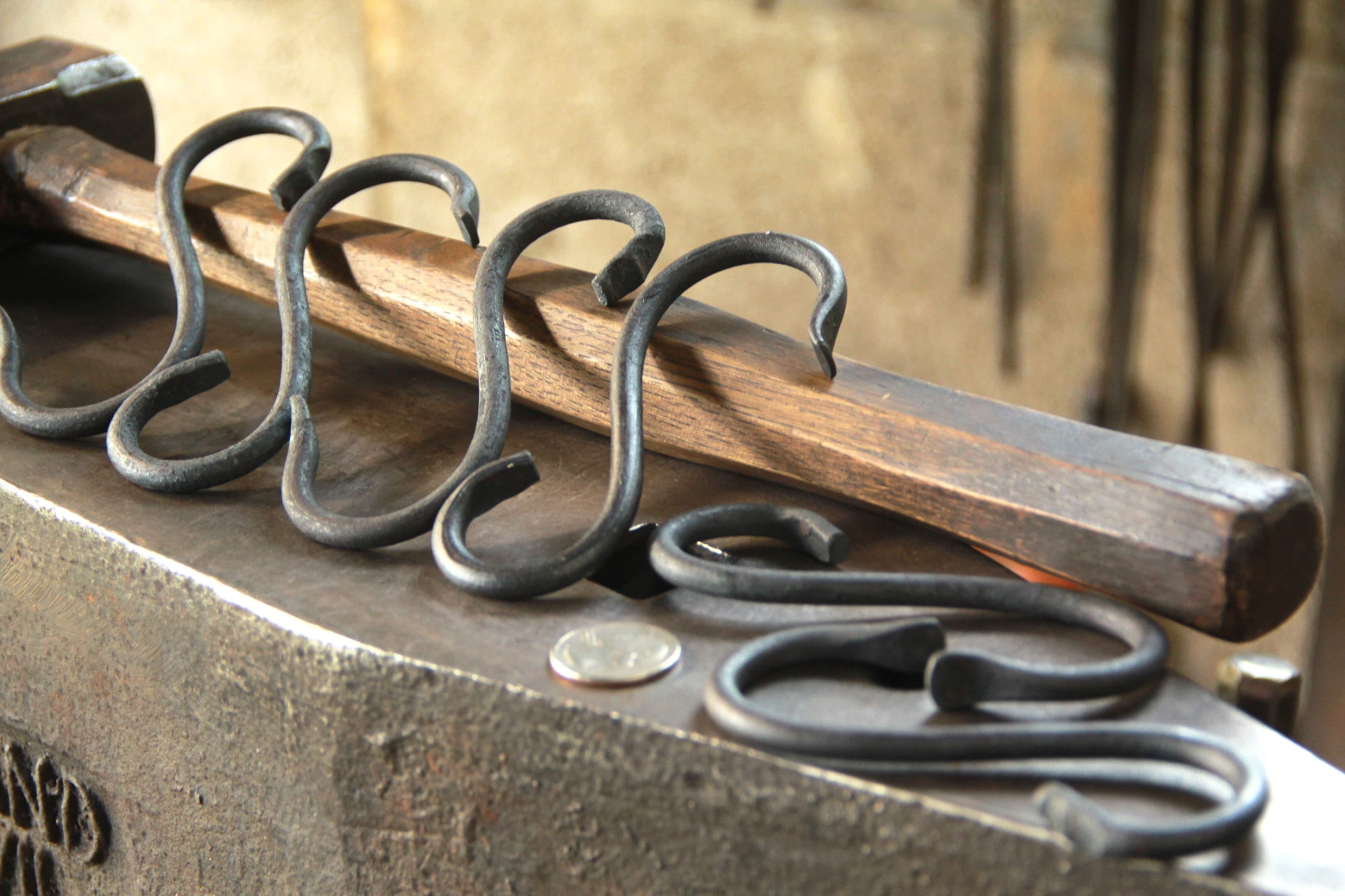 Rod iron holder for my Le Creuset pots from Enclume Ironworks out of  Portland. This rack is awesome! : r/castiron