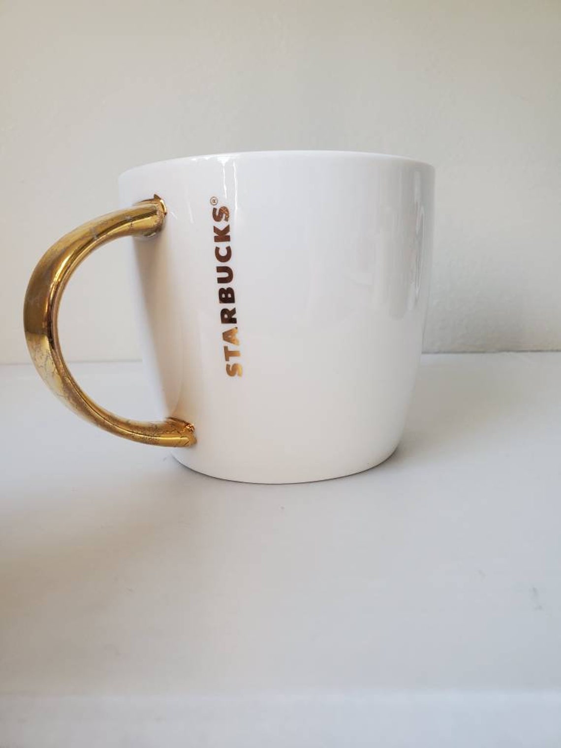 gold starbucks cup for sale