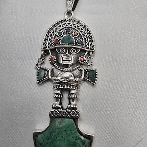 Handcrafted Inca Tumi Pendant: .950 Silver & Stone