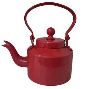 May include: A red metal teapot with a curved handle and a spout. The teapot has a lid with a small knob on top. The handle is attached to the body of the teapot with hinges.
