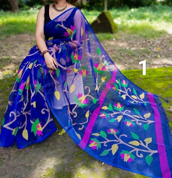 Buy Magenta Color Muslin Jamdani Saree with Allover Weaving At IndyVogue