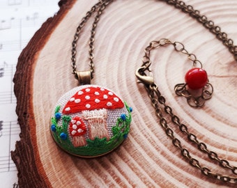 Hand embroidered mushroom pendant