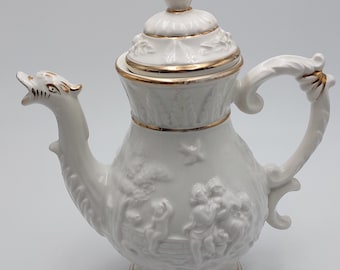 Capodimonte teapot with swan-shaped spout in fine white porcelain with gold finishes, made in Italy.
