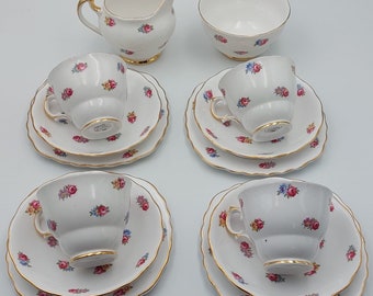 Porcelana Crown Regent: trío de té, azucarero, jarra de leche