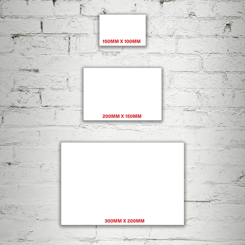 May include: Three white rectangular frames of different sizes against a white brick wall. The frames are labeled with their dimensions in millimeters: 150mm x 100mm, 200mm x 150mm, and 300mm x 200mm.