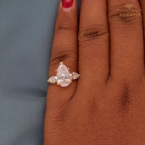 2.50 CT Pear Cut Moissanite Three-Stone 14K Yellow Gold Engagement Ring
